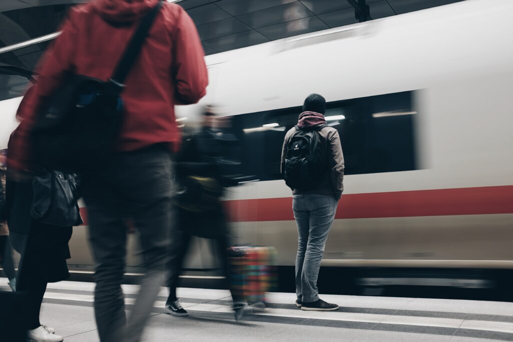 people waiting for a train - working 9-5