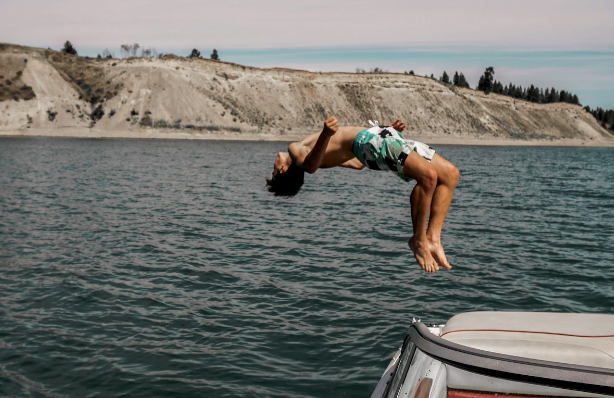 Man diving into see - holidays