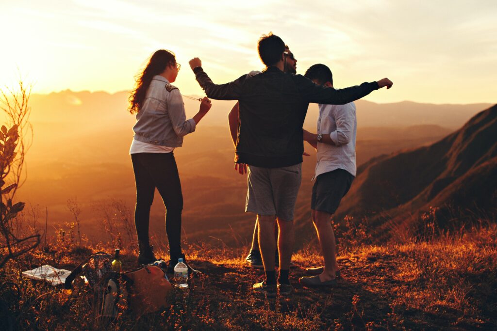 group of friends dancing Photo by Helena Lopes on Unsplash